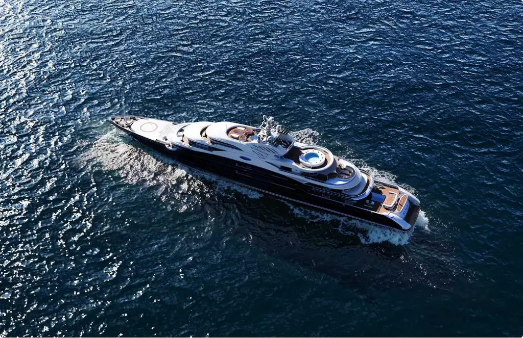 Aerial yacht rendering top view cruising across ocean with visible deck layout and wake