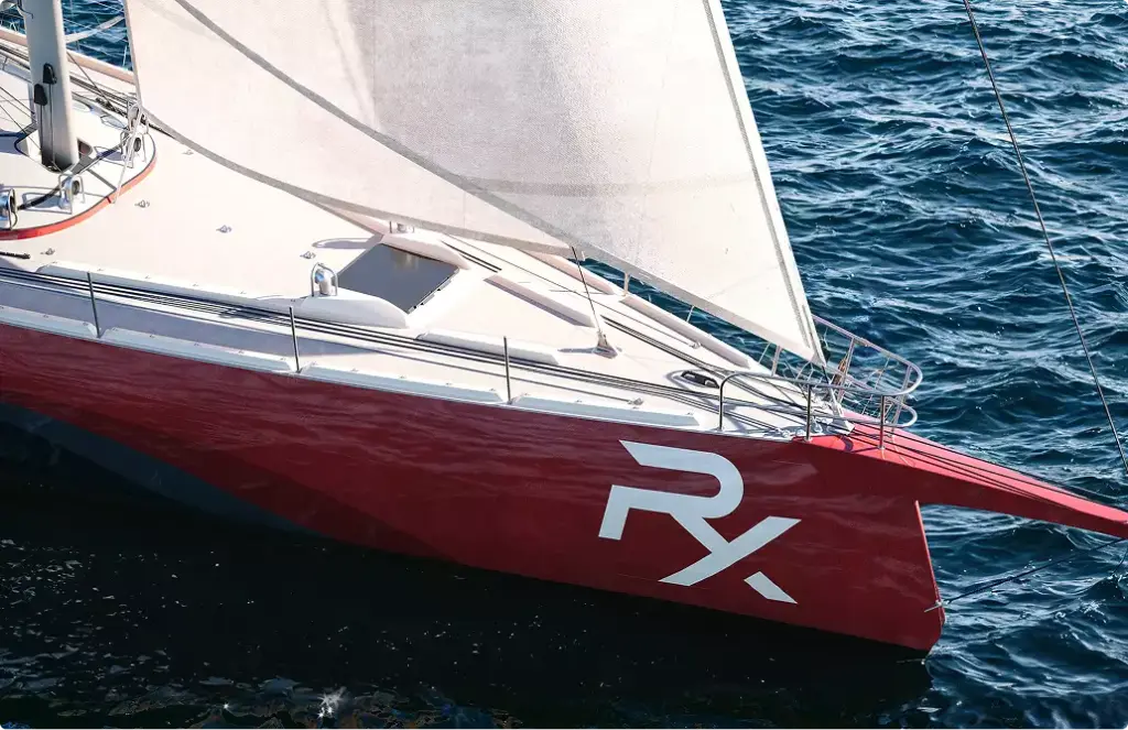 Sailing yacht rendering bow close up with red hull and white sail above ocean water
