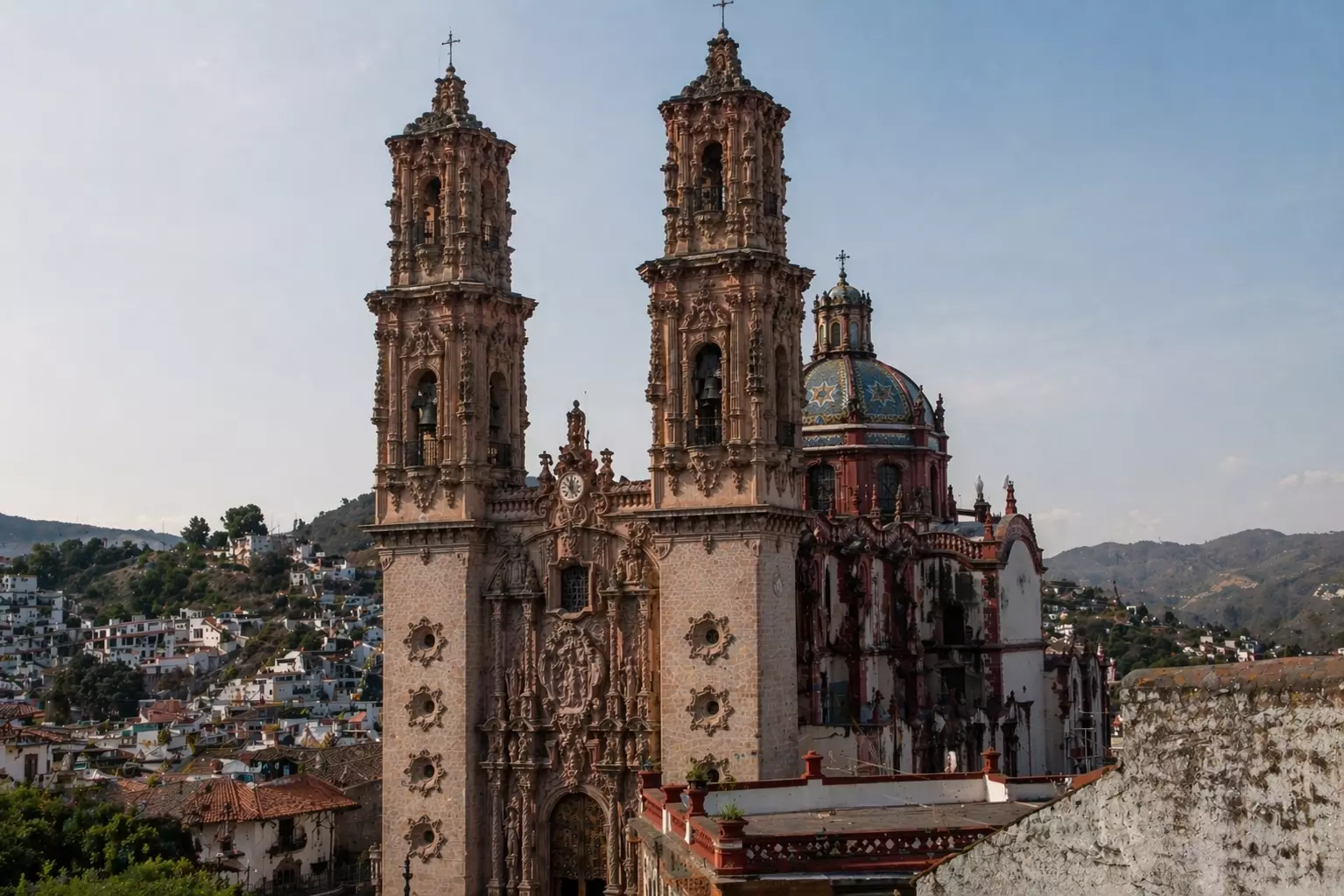 Historic cathedral with twin towers above hillside town, Baroque Architecture