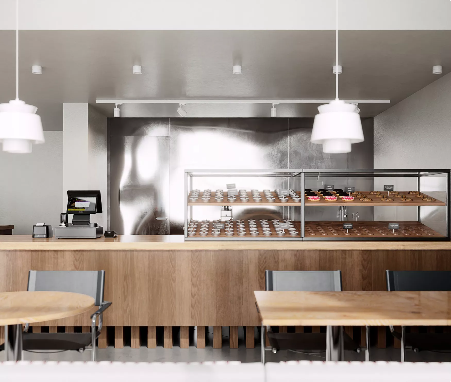 Cafe interior CGI with pastry display counter, wood finishes, and pendant lighting