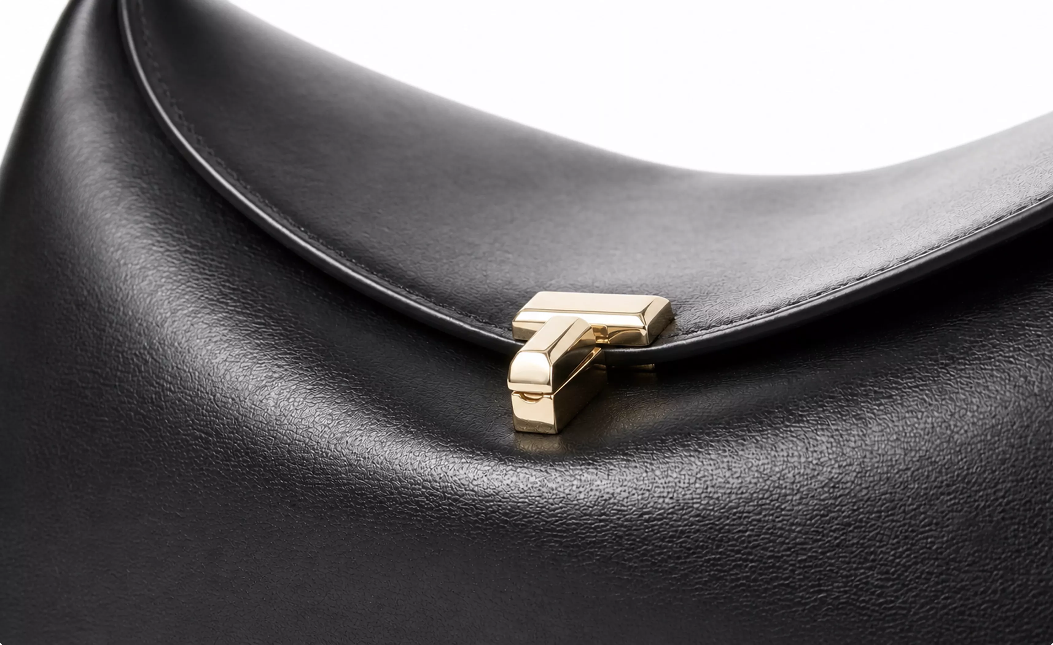 Photorealistic Toteme handbag CGI render with close-up gold clasp detail