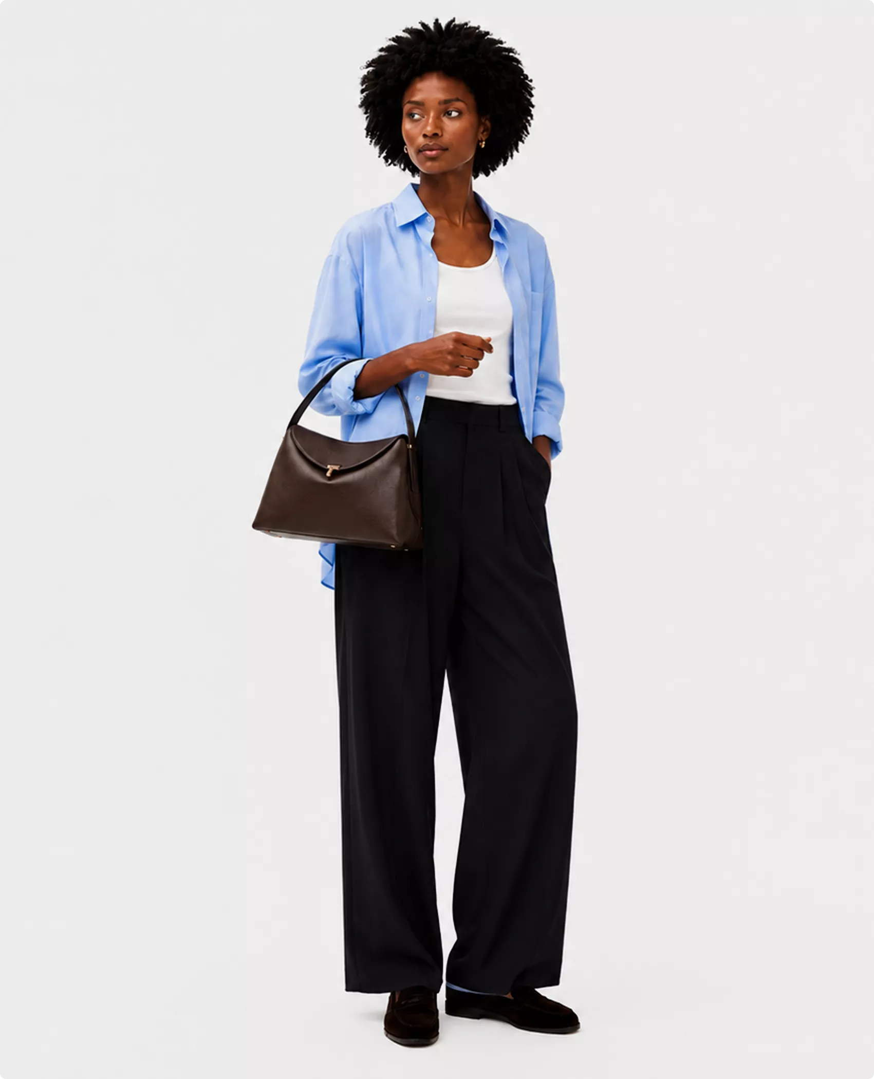 Premium leather Toteme bag CGI visualization with dark brown bag and blue shirt