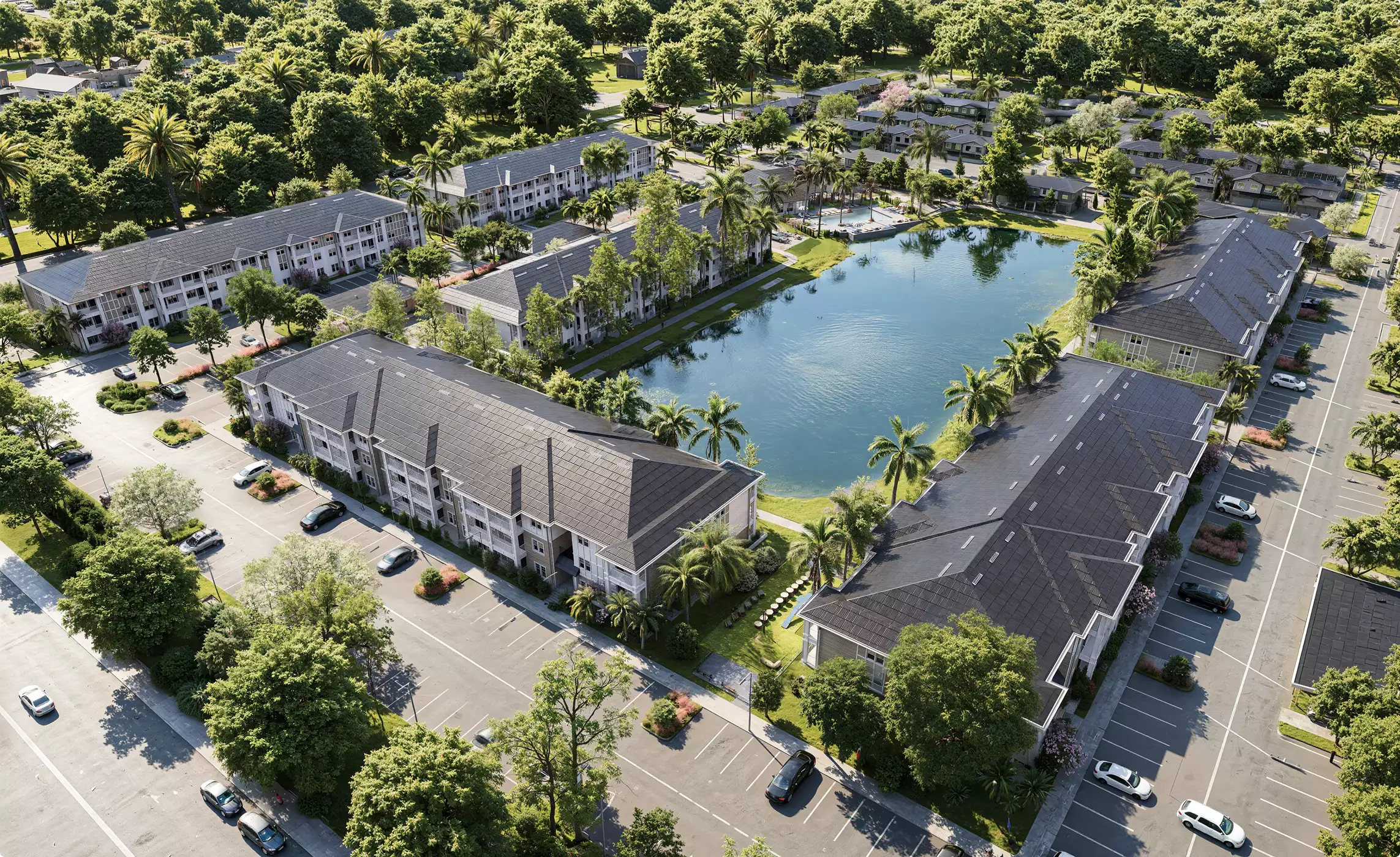 Tropical residential development CGI with apartment buildings, palm trees, parking areas, and central lake