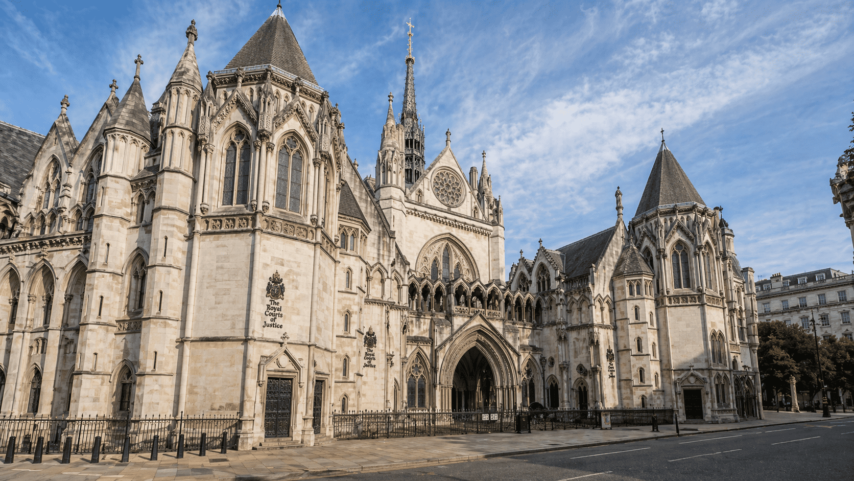 Victorian Architecture: A Complete Guide to Its History and Styles Royal Courts of Justice in London with Gothic arches, stone towers, and detailed facade
