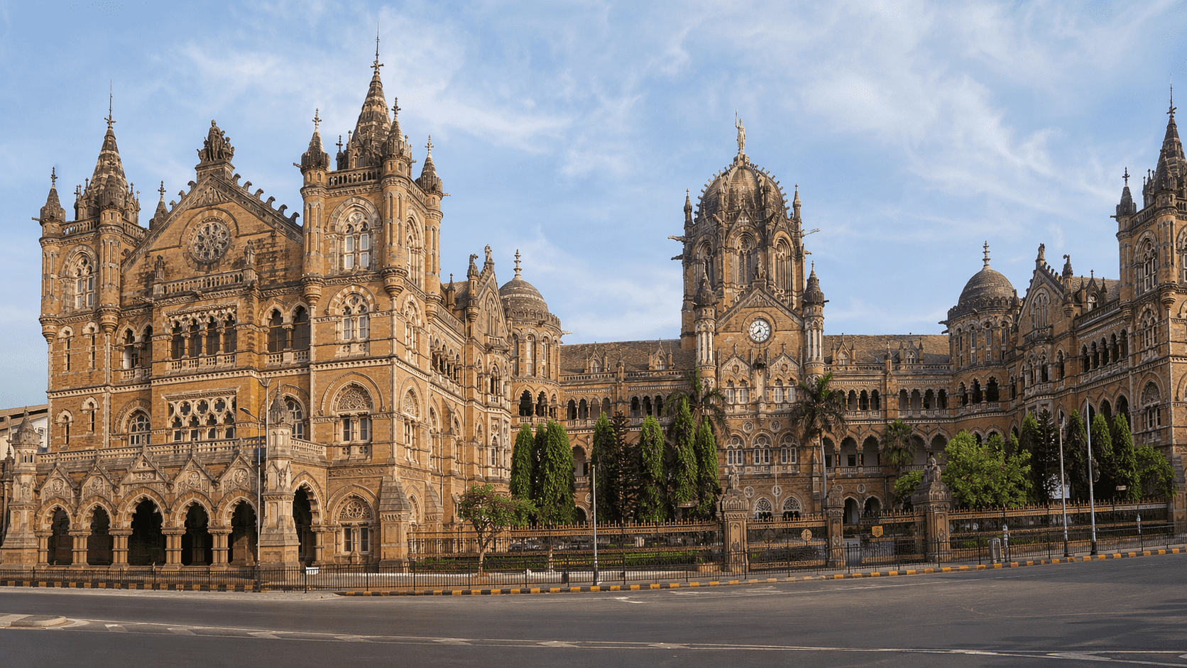 Victorian Architecture: A Complete Guide to Its History and Styles Victorian railway station with ornate domes, arched windows, and symmetrical stone facade