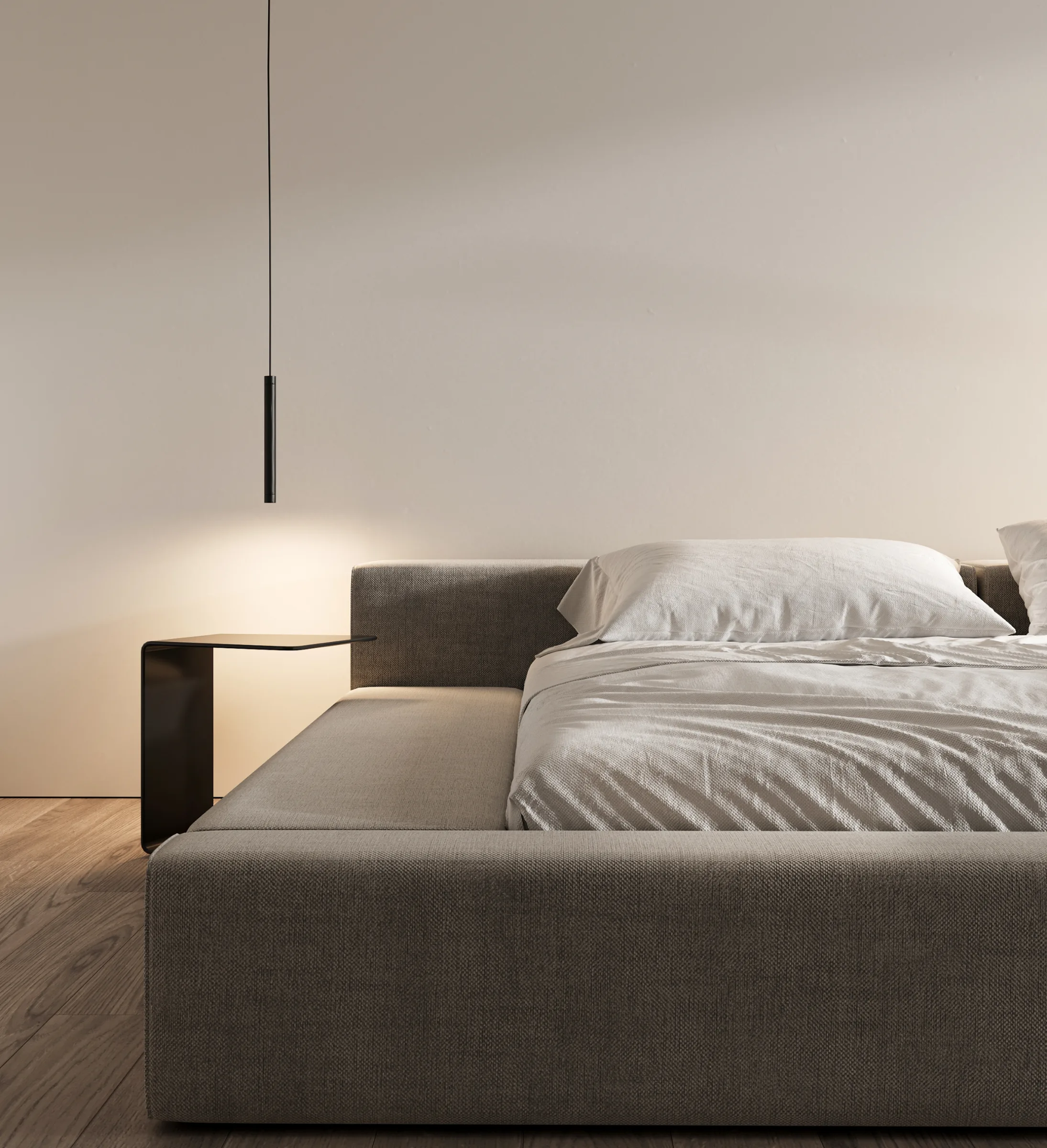 Minimal bedroom scene with pendant light, bedside table, and soft fabric textures.