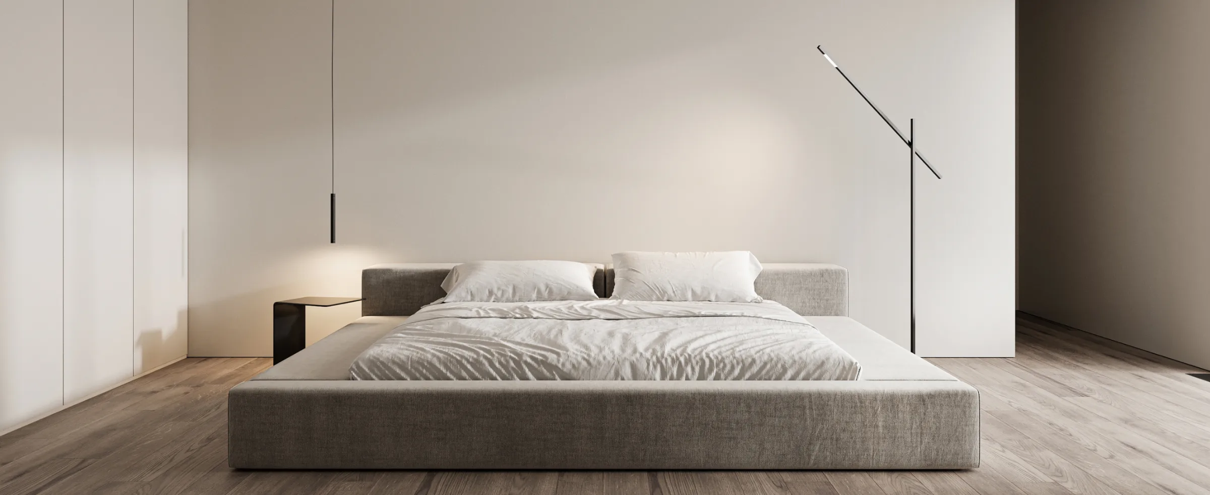 Contemporary bedroom with clean lines, neutral tones, and floor lamp beside the bed.