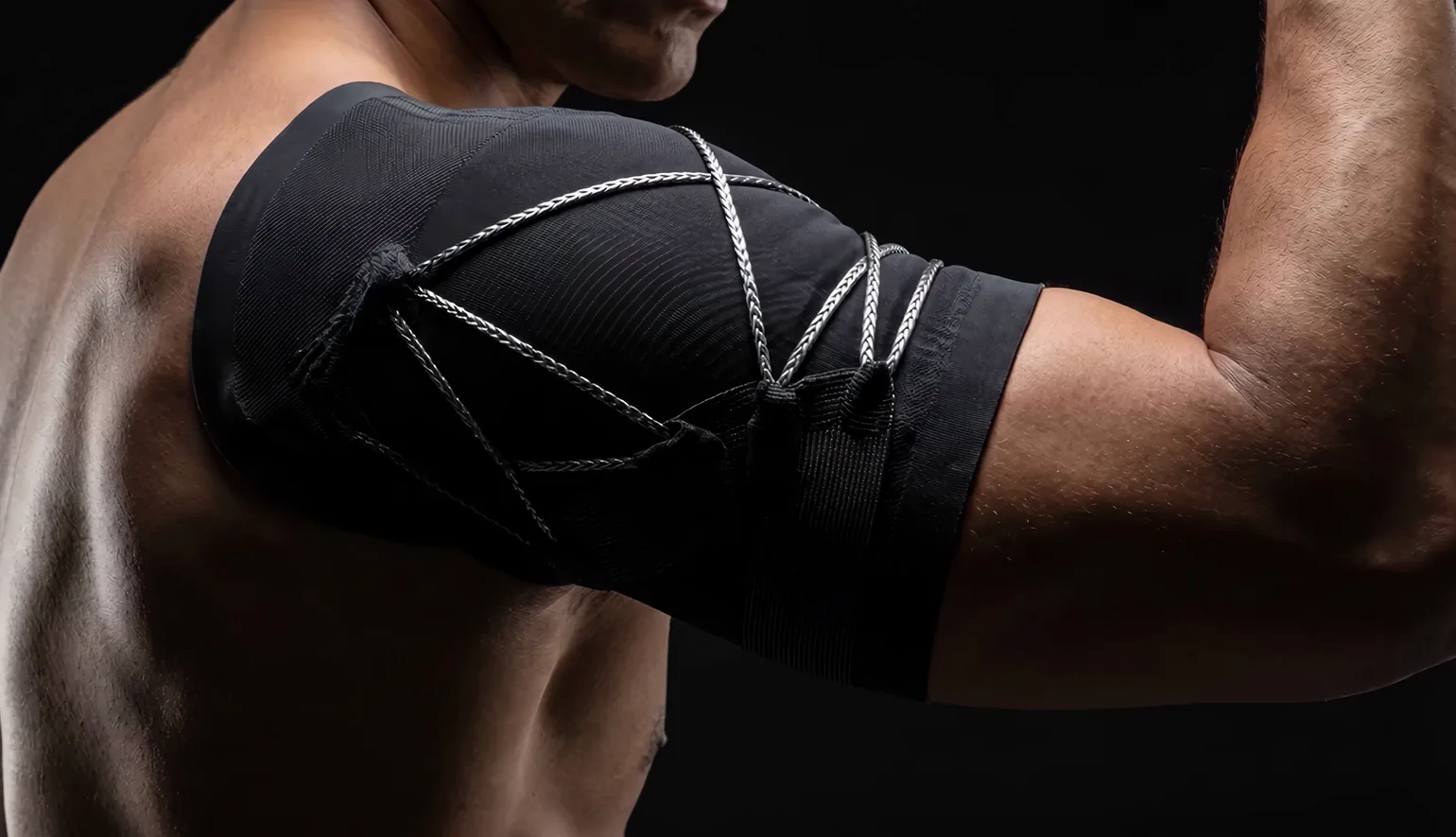 Close-up of a knee compression support on an athlete, technical material detail.